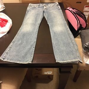 BUCKLE JEANS:: SILVER JEANS. SIZE 31/33